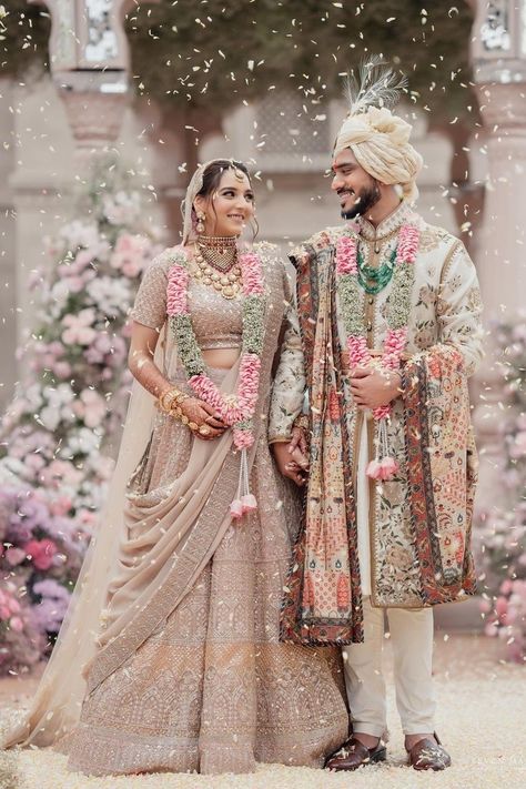 Millennial couples have often flaunted colour coordinated outfits at their weddings & to decode this trend, we have a list of couples in colour-combination outfits for inspo! Bride Groom Wedding Dress Indian, Bride And Groom Colour Combination, Bride And Groom Dress Combination Indian, Wedding Dress For Couple, Wedding Couple Dress Combination, Wedding Couple Dresses, Wedding Outfit Couple, Wedding Dress Combination, Couples Wedding Outfits