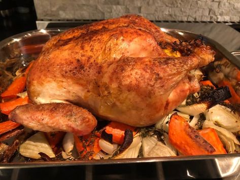 Ina Garten's roast chicken recipe is famous for a reason, it is a simple and delicious take on a classic dinner. The Barefoot Contessa first stuffed with thyme, garlic, and lemon, and the legs are tied together. The chicken is brushed all over with melted butter and seasoned with salt and pepper, before being placed on a bed of onion, fennel, carrots, and more thyme. Ina's instructions are easy to follow and yield chicken that is crispy on the outside and tender on the inside every time. Brown Paper Bag Turkey, Ina Garten Roast Chicken, Paper Bag Turkey, Cooking The Perfect Turkey, Barefoot Contessa Recipes, Perfect Roast Chicken, Celebrity Recipes, Ina Garten Recipes, Good Roasts