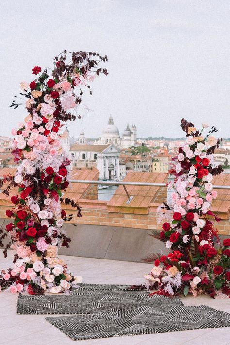 Pink And Red Flower Installation, Red And Pink Ceremony Flowers, Red Flower Arch Wedding, Red And Pink Wedding Party, Red And Pink Floral Arch, Red And Pink Wedding Florals, Red Pink Wedding Flowers, Pink And Red Florals, Red Pink Wedding Theme