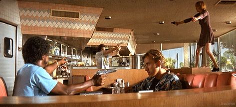 "I'm proud of you, Honey Bunny." - Pulp Fiction (1994) Pulp Fiction Diner, Mexican Standoff, Batman Movie Posters, Quentin Tarantino Movies, Tarantino Films, Movie Screenshots, Best Cinematography, Fiction Movies, Movie Shots