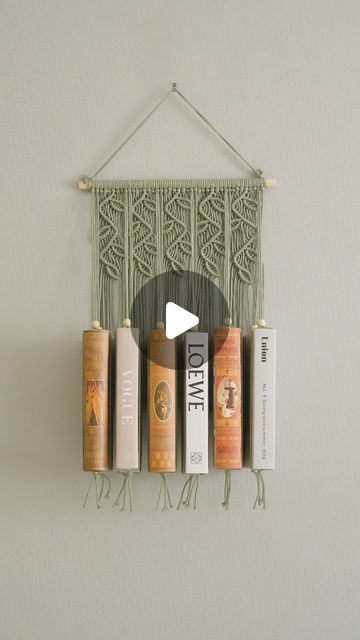 BeanDaikon Macrame on Instagram: "Let your little bookworms' imaginations soar with our whimsical Macrame Book Storage! 📚☁️ A magical nook for their favorite stories.

#BeanDaikon #MacrameHanger #HomeDecor #ChristmasDecor #HomeMade #HomeDecor #HandCraft #MacrameLove #HomeDecorIdeas #UniqueGifts #HandmadeDecor #BohemianChic #BohoArt #BookShelf" Macrame Bookshelf, Macrame Hanger, Book Storage, Boho Art, Macrame Patterns, Bohemian Chic, Handmade Decorations, Nook, Book Worms