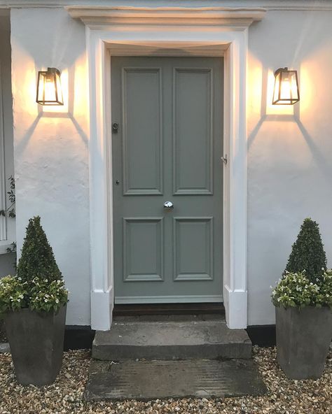 Claire on Instagram: “Just love our Calvi wall lights by @astrolighting. Lit up they are even more beautiful together with the beautiful timber panelled door…” Edwardian Villa, London Doors, 1930s House Exterior, House Frontage, Front Driveway, Hastings House, Victorian Front Doors, Cottage Front Doors, Front Door Lighting