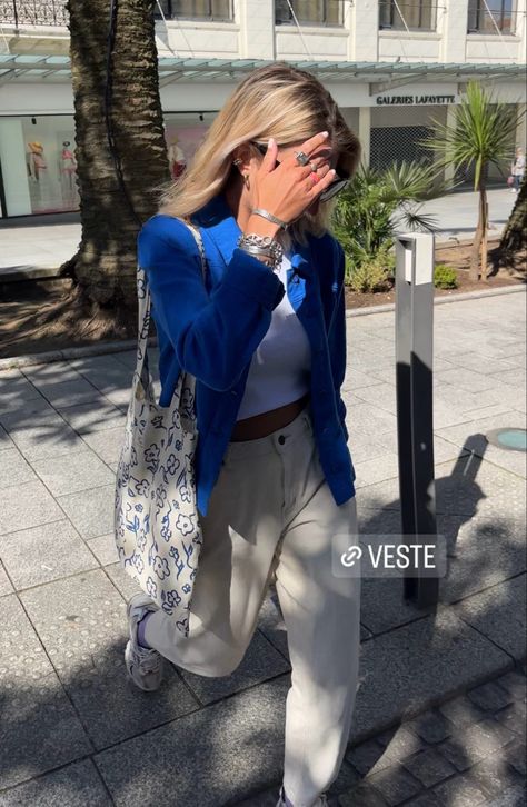 bright blue cardigan, white crop tee, light cream/white corduroy pants, sneakers, tote bag with blue White Corduroy Pants, White Crop Tee, Summer Europe, Cropped White Tee, Cardigan White, Europe Summer, Blue Cardigan, Blue Outfit, Light Cream