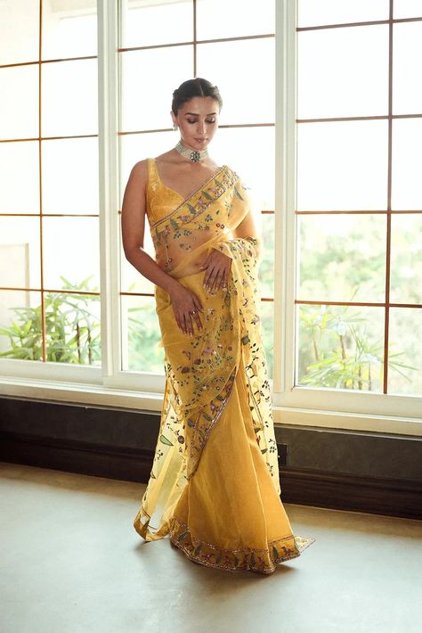 Anavila saris are being worn by Alia Bhatt, Sonam Kapoor and more celebrities, here's why | Vogue India Alia Bhatt Indian Wear, Alia Bhatt Saree, Organza Applique, Haldi Outfits, Haldi Outfit, Bridesmaid Saree, Yellow Saree, Saree Designs Party Wear, Saree Look