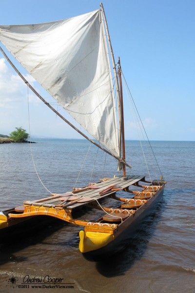 Hawaiian Double Hulled Canoe By: Andrew A Hawaiian double hulled canoe awaiting a crew below Pu’ukohala Heiau Hawaiian Canoe, Canoe Cart, Canoe Rack, Canoe Building, Canoe Boat, Outrigger Canoe, Row Boats, Cool Boats, Wood Boats