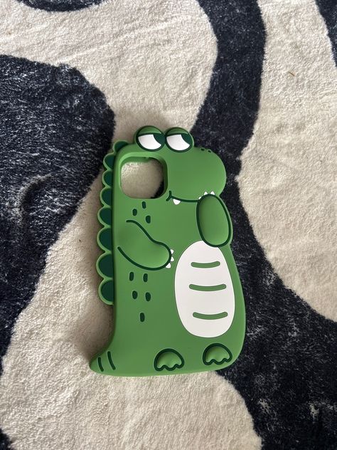 If you love dinosaurs, you'll fall head over heels for this sneaky dino iPhone case! Keep your phone protected while bringing a little prehistoric flair to your life. 🦖 #macbook #apple #iphone Dino Phone Case, Hopeless Quotes, Dinosaur Phone Case, Kitty Clothes, Hello Kitty Clothes, Funny Iphone Cases, Diy Iphone Case, Collage Phone Case, Stock Wallpaper