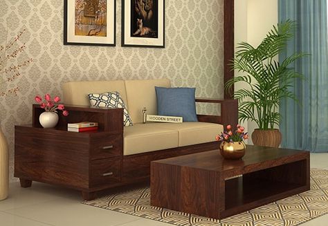 Buy Solace 2 Seater Wooden Sofa Online with Walnut Finish and add this #elegant #two #seater #sofa to your living space for beautiful #interiors and attain #lively impact. Get #2SeaterSofa #with #storage online from the fantastic range #Ahmedabad #Hyderabad #Bhopal #Faridabad बेडरूम डिजाइन, Drawing Room Decor, Indian Living Rooms, L Shape Sofa, Wooden Sofa Designs, Indian Home Interior, Wooden Sofa Set, Living Room Partition Design, Living Room Sofa Design