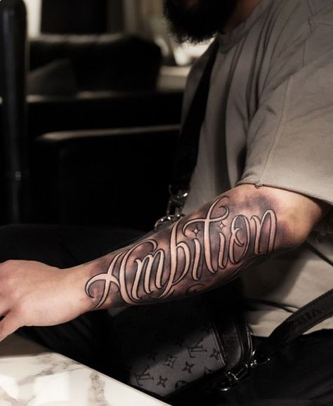 Spectacular men’s tattoos 16 ideas to express your personality Ambition Tattoo Forearm, Ambition Tattoo Design, Tattoo Word Designs, Tattoo Designs Words, Tattoo Words Ideas, Tattoo Words Design, Ambition Tattoo, Respect Tattoo, Aa Tattoos