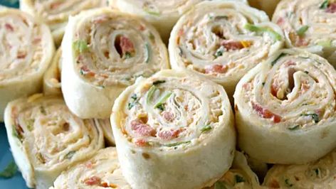 Chicken Enchilada Pinwheels - Mexican Recipes - Old El Paso Tortilla Pinwheels Recipe, Pinwheel Recipe, Mexican Food Recipes Appetizers, Tortilla Pinwheels, Pinwheel Appetizers, Mexican Appetizers, Tortilla Rolls, Roll Ups Recipes, Pinwheel Recipes