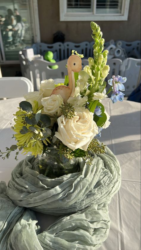 Dinasour Baby Shower Centerpiece, Dinosaurs Baby Shower Ideas, Hatching Soon Baby Shower Theme, Baby Dinosaur Centerpieces Ideas, Boy Baby Shower Ideas Dinosaur, Boho Dinosaur Baby Shower Ideas, Dino Baby Shower Centerpieces, Boy Baby Shower Dinosaur Theme, Hatching Soon Dinosaur Baby Shower Ideas