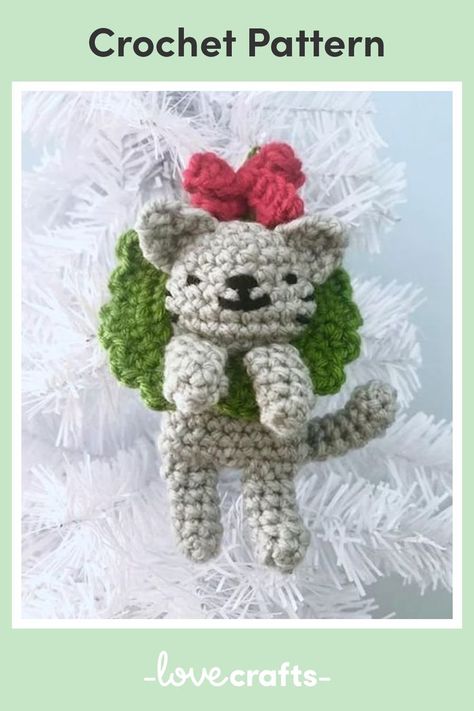 Looking for a unique and heartwarming addition to your Christmas tree? Check out this beginner-friendly crochet pattern by Amy Gaines for a charming cat in a wreath Christmas ornament! You'll fall in love with its simplicity and charm. Download the pattern and start stitching today! Cat Christmas Ornaments, Deer Pattern, Crochet Ornaments, Christmas Patterns, Ornament Pattern, Christmas Ornament Pattern, Cat Ornament, Wreath Christmas, Crochet Cat