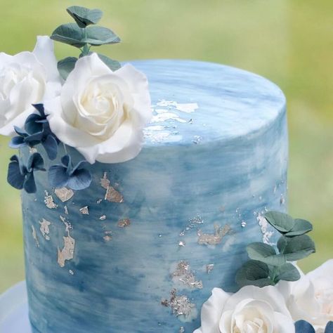 Charlotte | Wedding Cakes | Sugar Flowers on Instagram: "A 2-tier dusky blue wedding cake with watercolour marbled detail and ombre ruffles. Along with sugar flowers surrounded by silver leaf, which reflected the light beautifully. Congratulations to the happy couple who were married today at Low Wood Bay Resort & Spa! #weddingcake #blueweddingcake #lakedistrictwedding #cumbriawedding #sugarflowers #cakedesign #bluewedding #duskyblue #lakedistrict" Blue Ombre Wedding Cake, Dusky Blue Wedding, Cornflower Blue Wedding, Blue Wedding Cake, Wedding Cake Ombre, Lake District Wedding, Wedding Cakes Blue, Dusky Blue, Charlotte Wedding