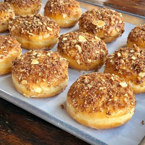 Firecakes Donuts on Instagram: “Peach Cobbler donuts with an almond crumble 😍😍 #cantgetenough ____________________________________________________ #donuts” Almond Crumble, Peach Cobbler, Cobbler, Hamburger Bun, Donuts, Almond, Bread, On Instagram, Instagram