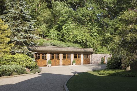 Cool garage built into the hillside. Garage On Hillside, Hillside Garage Plans, Garage In Hillside, Garage Built Into Hill, Garage Built Into Hillside, Hillside Garage, Ferguson Shamamian, House Built Into Hillside, Classic Garage