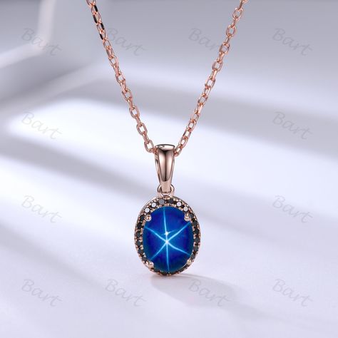 Oval star sapphire pendant necklace, Oval Halo Blue Star Sapphire and Black Diamond Sunburst Ring ,Bridal oval pendant silver, Birthday Gift ◆ Product Specifications ※14K rose gold ※ Spring clasp ※ 7x9 oval cut lab created blue star sapphire 1.8 Carat ※ Outer pendant size: 9x11mm ※ Halo stone: 1.0mm black diamond(for gold) or black cz( for silver) ※ Ring Setting height: 3.3mm ※Spring ring clasp closure; cable or rope link chain ※Adjustable 18" (45cm) length, 20" (50cm),22" (55cm) ※Made in the US Star Sapphire Necklace, Sunburst Ring, Sapphire Pendant Necklace, Blue Sapphire Jewelry, Silver Birthday, Sapphire Necklace Pendants, Blue Star Sapphire, Whimsical Jewelry, Diamond Tiara