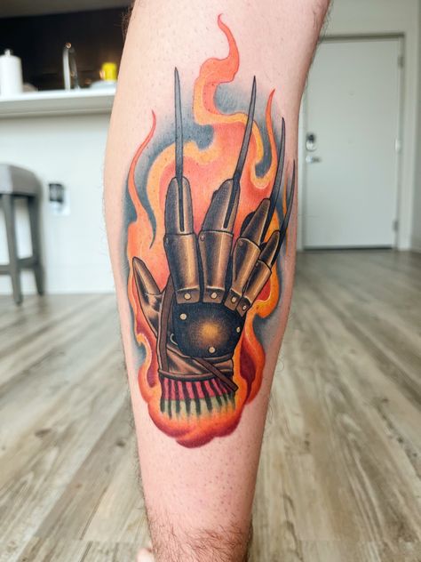 Tattoo of Freddy Krueger’s glove engulfed in flames Freddy Krueger Glove Tattoo, Nightmare On Elm Street Tattoo, Freddy Krueger Glove, Elm Street Tattoo, Tattoo Nightmares, Horror Movie Tattoos, Movie Tattoos, Scary Tattoos, A Nightmare On Elm Street