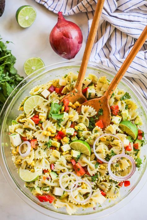 Cilantro lime pasta salad is a new spin on a classic flavor combo! My family and friends rave about this 25-minute, easy pasta salad recipe that uses fresh ingredients like red pepper, corn, and onion to make a light, healthy, and tasty side dish. It’s the perfect potluck pasta salad and has that iconic cilantro lime flavor that makes it perfect as a summer side dish, a great side dish for grilling, or just as a make-ahead meal prep recipe you can enjoy straight from the fridge all week long. Cilantro Lime Pasta Salad, Cilantro Lime Pasta, Lime Pasta Salad, Potluck Pasta Salad, Lime Pasta, Make Ahead Salads, Summer Side Dish, Easy Pasta Salad Recipe, Cilantro Lime Dressing