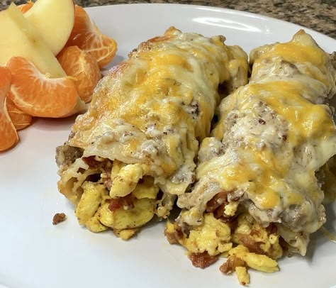 Loaded Smothered Breakfast Burritos Loaded Smothered Breakfast Burritos, Loaded Breakfast Burritos, Smothered Breakfast Burritos, Potluck Breakfast, Breakfast Burritos Easy, Camper Recipes, Breakfast Potluck, Potatoes And Cheese, Beef Meals