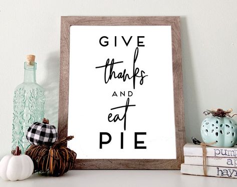 Our newest Thanksgiving printable is Gives Thanks and Eat Pie. The perfect Farmhouse sign to add to your Autumn decor. Just a few clicks and you can print this instant download from your home computer or take it to your favorite print shop.  Happy Thanksgiving!   | How to Make Your Purchase | 1. Thanksgiving Cabinet Decor, Thanksgiving Boards Signs, Thanksgiving Wooden Signs, Thanksgiving Signs And Sayings, Thanksgiving Signs Diy, Thanksgiving Wood Signs, Thanksgiving Chalkboard, Holiday Boards, Thanksgiving Quotes Funny