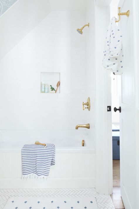 Subway tile surround, bead board on tub front, chevron tile floor, live brass fixtures. White Herringbone Floor, White Subway Tile Bathroom, Gold Bad, Subway Tiles Bathroom, Jack And Jill Bathroom, Brown Bathroom, Bathroom Tub, Boys Bathroom, Jack And Jill