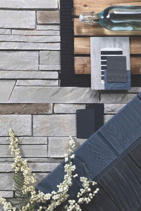 Mission Point™ will forever be one of our favorites! 😍 We love the beautiful blue tones incorporated into the stone panels; it creates a one-of-a-kind color that we can’t take our eyes away from! 👀⁠ ⁠ Keep it simple by adding blue siding to the exterior of your house to match our Versetta Stone® siding. Combining elements like glass and wood always look amazing with our Ledgestone panels! 🥳⁠ Versetta Stone Mission Point, Versetta Stone Exterior, Grey Vinyl Siding, Versetta Stone, Stone Feature Wall, Stone Veneer Panels, Blue Siding, Manufactured Stone Veneer, Stone Exterior