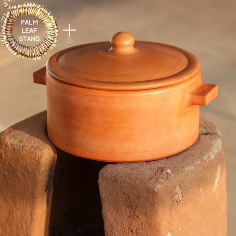 Swadeshi Blessings brings to you an Exclusive Indian Traditional Earthen Cookware Range that will surely help you create a 'WOW' factor experience in front of your guests. It is beautifully handcrafted by the abled craftsman of Rajasthan, India. The founders of Swadeshi Blessings vowed to make a difference in the lives of thousands of local craftspeople & artisans thereby creating a global marketplace for them. With every purchase, you make through 'Swadeshi Blessings' you contribute to the Earthen Pots, Handmade Clay Pots, Organic Store, Wood Ash, Bean Pot, Flower Business, Country Shop, Indian Curry, Gas Cooktop