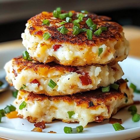 Who wouldn’t love a delectable solution for leftovers? These Loaded Mashed Potato Cakes are the perfect way to breathe new life into your mashed potatoes. Loaded Mashed Potato Cakes, Loaded Potato Cakes, Oven Baked Mashed Potato Cakes Recipe, What To Do With Mashed Potato Leftovers, Ideas For Leftover Mashed Potatoes, Mashed Potato Ideas, Mashed Potatoes Leftovers Ideas, Leftover Mashed Potatoes Recipe, Potato Cakes From Mashed Potatoes