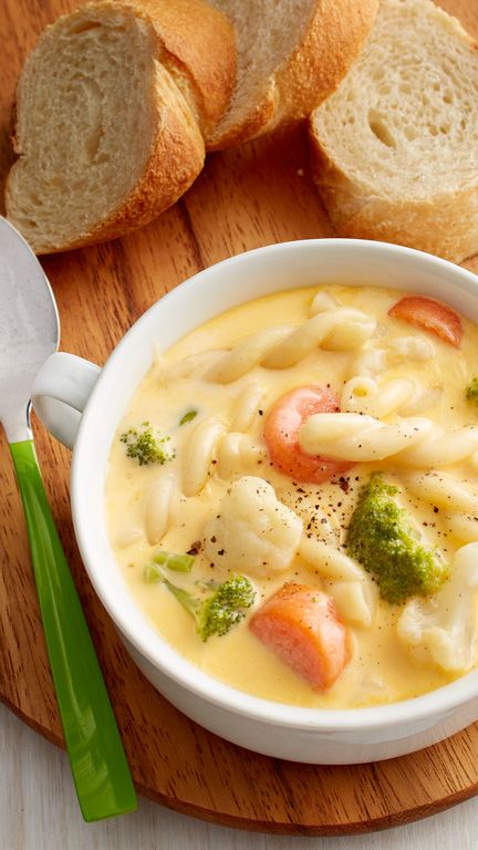 Cheesy Pasta-Vegetable Soup: Garlic powder adds subtle flavor to this cheesy, veggie-packed soup. No extra dirty dishes involved—just one pot and 25 minutes are all you need. Cheesy Soups, Soup Veggie, Best Winter Soups, Cheesy Vegetable, Cozy Soups, Easy Home Recipes, Quick Soup, Comfort Soup Recipes, Pillsbury Recipes