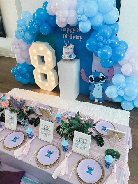 Stitch Birthday Party | CatchMyParty.com Stitch Loot Bag, Stitch Table Decorations, Lilo And Stitch Birthday Centerpieces, Stitch Party Theme Ideas, Stitch Birthday Decoration Ideas, Hawaiian Stitch Birthday Party, Stitch Birthday Centerpieces, Stitch Birthday Party Girl, Lilo And Stitch Pool Birthday Party