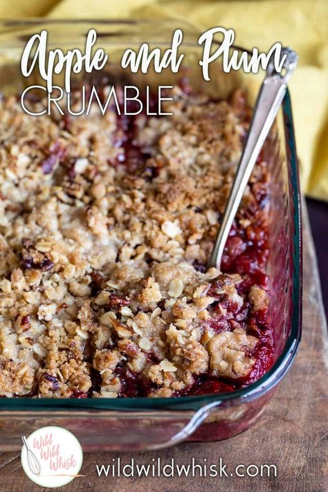 This easy and delicious Apple and Plum Crumble is the perfect transitional dessert from Summer to Fall. It marries the two seasons with beautiful fruits and the warmth of apple pie spice, topped it all off with a nutty buttery pecan crumble. #wildwildwhisk #applecrumble #plumcrumble #appleandplumcrumble #appleplumcrumble Plum And Apple Crumble, Plum Crisp, Winter Holiday Recipes, Pecan Crumble, Plum Crumble, Plum Pie, Plum Tart, Plum Recipes, Fruit Crumble