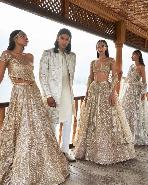 A POÈME BY THE LAKE: KASHMIR Bringing in an alluring look with silver and gold lehengas embellished crystals that look absolutely… | Instagram Falguni Shane Peacock, Bridal Store, Bridal Lehenga Choli, By The Lake, Flagship Store, Blue Skies, Executive Producer, Vibrant Blue, Bridal Lehenga