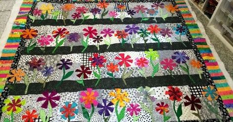 Remember yesterday when I showed you the link to the free Color Fun Daisies by Linda Sullivan?  Marcy W. sent me a picture of this quilt t... Artsy Quilts, Attic Window Quilts, Dresden Plate Patterns, Row Quilts, Window Quilt, Attic Window, Sewing Patchwork, Sunflower Quilts, Row Quilt