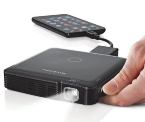 Tech - Pocket Projector | The Gentleman's Journal | The latest in style and grooming, food and drink, business, lifestyle, culture, sports, restaurants, nightlife, travel and power. Pico Projector, Projector Tv, Smartphone Gadget, Hissy Fit, Smartphone Holder, Cool Electronics, Energy Technology, Futuristic Technology, Transportation Design