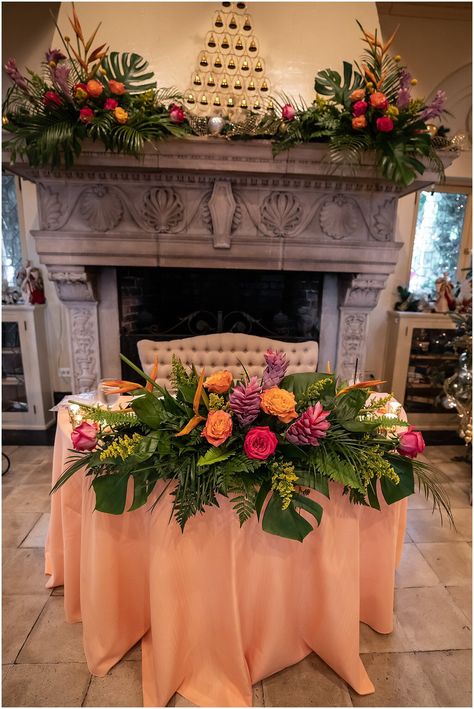 Peach Sweetheart Table, Tropical Wedding Reception Ideas, Peach And Pink Floral Centerpieces, Peach Tropical Wedding, Tropical Wedding Flower Arrangements, Sweetheart Table Wedding Tropical, Tropical Flowers Arrangements, Pink And Peach Wedding, Tropical Sweetheart Table