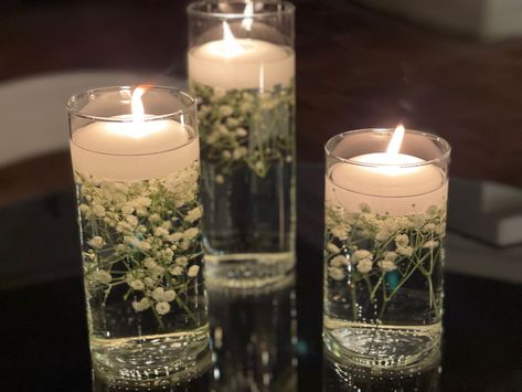 Floating Tealight Centerpiece, Floating Candles And Babys Breath, Beta Fish Centerpiece Ideas, Floating Candle Centerpieces Diy Simple, Candles In Water Centerpieces, Orbeez Wedding Centerpiece Ideas, Wedding Table Settings Rectangle, Minimalistic Centerpiece Wedding, Simple Round Table Centerpieces