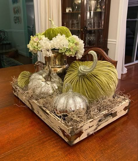 green velvet pumpkins and mercury glass ones in a wooden tray with hay for a lovely Thanksgiving centerpiece Pumpkin Mantle Display, Decorating With Glass Pumpkins, Glass Pumpkin Centerpiece, Velvet Pumpkins Display, Mercury Glass Pumpkins, Thanksgiving Deals, Silver Pumpkins, Pumpkin Centerpiece, Fall Vignettes