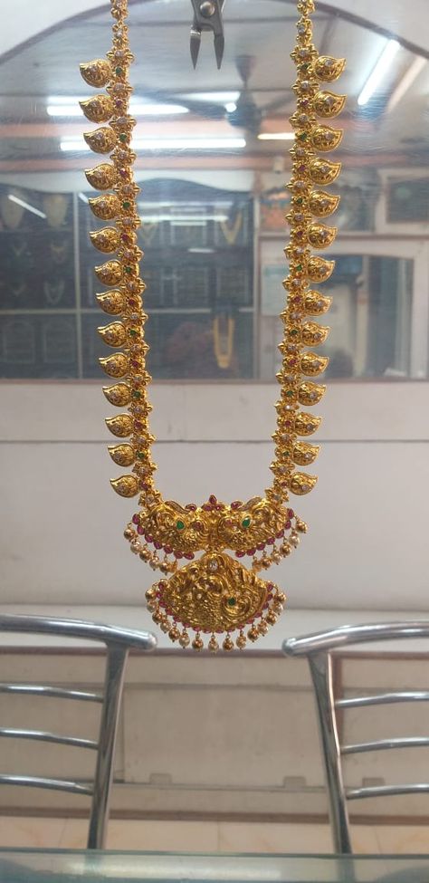 Mango Haram With Lakshmi Pendant, Long Haram Designs Indian Gold Latest, Latest Long Chain Designs In Gold, Long Chains Indian Gold Latest, Latest Long Haram Gold Jewellery Designs, Haram Designs Gold Latest Long, Mango Haram Designs, Haram Designs Gold Latest, Pretty Gold Necklaces