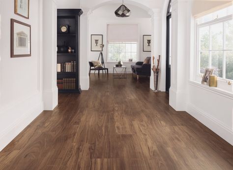 Design tip! Use deep, richly colored tones like the Character Walnut colorway from Karndean Designflooring to create a warm, welcoming mood in your home. Stop in and see us at Creative Carpet & Flooring to get a closer look at Character Walnut and a sample for your home. Dark Brown Vinyl Flooring, Dark Vinyl Flooring, Brown Vinyl Flooring, Modern Linoleum Flooring, Dark Brown Wood Floors, Classic Interior Design Living Room, Dark Living Room Ideas, Dark Flooring, Cozy Cubicle