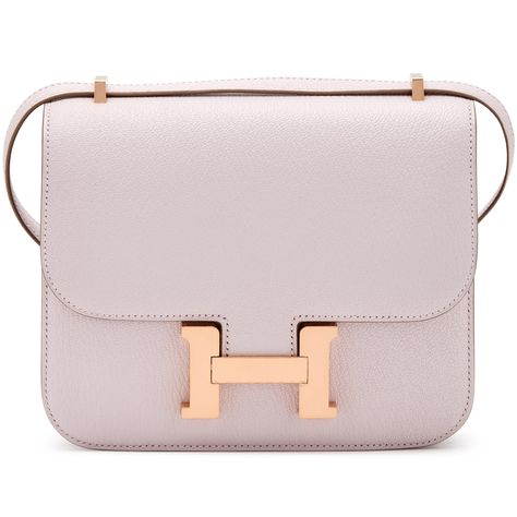 <p>Hermès Mauve Pale Chèvre Mini Constance 18 Rose Gold Hardware, 2023</p><ul><li>The interior is lined in a tonal agneau leather</li><li>Includes felt protector, care booklet, dust bag, and box</li><li>Dimensions: 15 h x 18 w x 5.5 d cm</li></ul> 2023 Handbags, Mini Constance, Hermes Constance Bag, Accessories 2023, Hermes Constance, Rose Gold Hardware, Handbag Accessories, Gold Hardware, Dust Bag