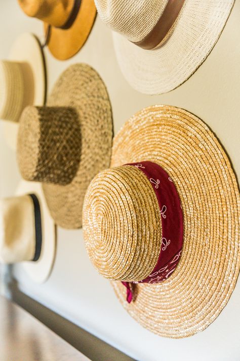 How to create a stylish, neutral hat wall display in your home. | Modish and Main Hat Wall Display, Beach Souvenirs, Hat Wall, Closet Hacks Organizing, Vendor Booth, Straw Hat Beach, Hat Display, Boho Shops, Bay House