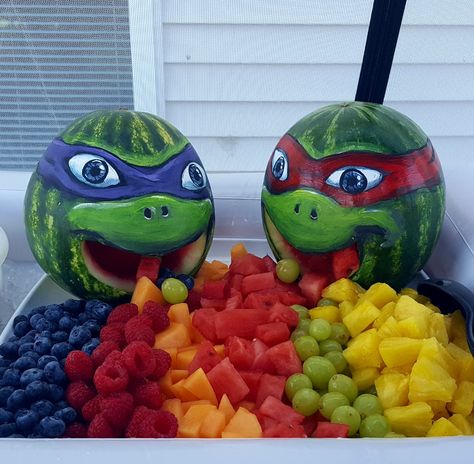 Hand painted Ninja Turtles watermelons make a great way to celebrate a birthday party Ninja Turtles Pool Party Ideas, Ninja Turtle Fruit Tray, Ninja Turtle Cakes For Boys, Ninja Turtle Balloon Arch, Threenage Mutant Ninja Turtles, Ninja Turtle Girl Birthday Party, Ninja Turtles Birthday Party Ideas Girl, Ninja Turtles Birthday Party Ideas Cake, Ninja Turtle Birthday Party