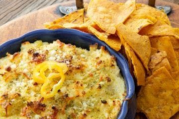 Hungarian Hot Pepper Cheese Dip | Topor's Pickle Company | Food products supplier in Detroit, MI Pepper Cheese Dip, Hot Pepper Dip, Pepper Dip Recipe, Kosher Dill Pickles, Pepper Dip, Stuffed Pepper Dip, Cheese Stuffed Peppers, Dill Pickles, Salsa Dip