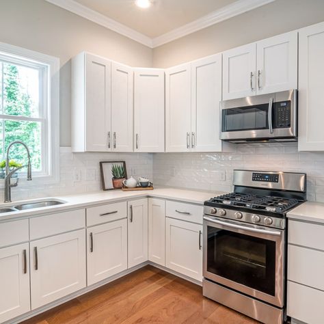 White shaker kitchen will provide a clean, bright look and light feel to any home. ⠀ ✨Put blinds, draperies, or window film to shadow your cabinets from direct sunlight. ✨When you start cooking, turn on the ventilation.⠀ ✨Don’t use scouring pads or abrasive cleansers.⠀ ✨Once a week, wipe your shaker cabinets with warm water and dampened soft cotton cloth. Add mild dishwashing liquid to the water if needed.⠀ ⠀ Do you have any helpful tricks to share?⠀ #whitecabinets #whitekitchen #kitchendesign Wooden Kitchen Cabinets, White Shaker Kitchen, Space Beautiful, White Shaker Cabinets, Shaker Kitchen Cabinets, Kabinet Dapur, Refinishing Cabinets, Stainless Steel Cabinets, Shaker Cabinets