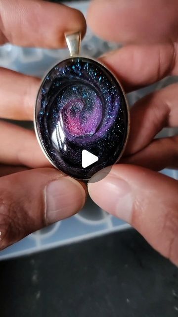 Daniel Cooper on Instagram: "Galaxy technique #252 on my YouTube   This piece was made over 2 years ago and has proven difficult to make again. In #252 on my YouTube channel, I try again and show the process in how to make these stunning resin art jewelry pendants.  Resin art, resin, jewelry making, galaxy, epoxy, epoxy art, jewelry.  #resinart #resin #jewelrymaking" Galaxy Epoxy, Resin Art Jewelry, Sculpted Jewelry, Epoxy Art, Resin Jewelry Making, Epoxy Resin Crafts, Art Resin, Jewelry Pendants, Resin Pendant