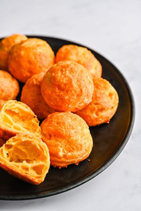 These Cheddar Gougères are essentially French cheese puffs made with choux pastry, and they're absolutely delicious! Crisp on the outside, light, puffed and airy on the inside and perfectly cheesy, these are a lovely appetizer to enjoy with wine or cocktails. Easy Thanksgiving Appetizer, French Cheese Puffs, Thanksgiving Recipe Ideas, Choux Dough, Christmas Side Dish Recipes, Thanksgiving Appetizers Easy, Thanksgiving Appetizer, Thanksgiving Salad, Outside Light