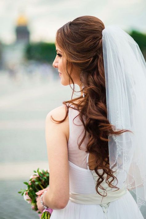 42 Wedding Hairstyles With Veil Wedding veil is an undisputed symbol of every bride. There are so many ways to wear it. We have collected best wedding hairstyles with veil that you will love. See more: https://www.weddingforward.com/wedding-hairstyles-with-veil/ #wedding #bride #weddingforward #bridalhair #weddinghairstyleswithveil Veil Hair Down, Make Up Sposa, Bridal Hair Veil, Romantic Hairstyles, Elegant Wedding Hair, Wedding Hairstyles With Veil, Best Wedding Hairstyles, Veil Hairstyles, Wedding Hairstyles Half Up Half Down