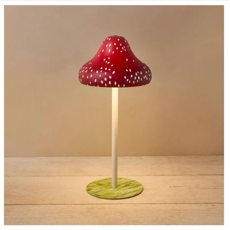 Rechargeable Mushroom Light By John Derian For Target Add A Whimsical Touch Of Illumination To Your Living Room Or Any Bedroom With This Mushroom Novelty Table Lamp From John Derian For Target. Featuring Artwork By Decoupage Artist John Derian, This Novelty Table Lamp Is Designed With A Flat Grass Base, A White Stem And A Red Mushroom Cap Shade With White Spots. The Lamp Features A Convenient Touch-Activated Sensor And Three Brightness Settings, And It Can Be Recharged With The Included Usb Char Mushroom Light, Red And White Mushroom, Red Table Lamp, Mushroom Lights, Red Mushroom, White Mushrooms, Tall Lamps, John Derian, Stuffed Mushroom Caps