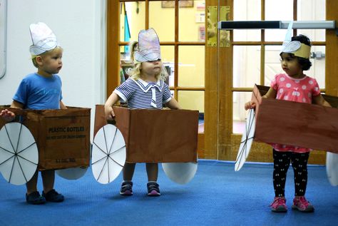 Wagon Races!  This is an inexpensive and easy gross motor activity that Toddlers - Pre-K can enjoy.  The wagons are made from cardboard boxes (make cut-out handles on the sides if there are none) with the top and bottom folds removed, and are painted brown with tempera paint.  The wheels are made from white poster board with brown yarn hot-glued on a the spokes. Western Vbs, Wild West Crafts, Pediatric Physical Therapy Activities, Rodeo Art, Gross Motor Activity, Wild West Theme, Toddler Themes, Toddler Class, Brown Yarn