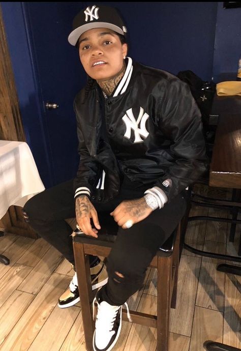 Young Ma Rapper, La Fitted Cap, Letterman Jacket Outfit, Young Ma, Jordan Fits, Graphic Jackets, Drip Outfit Men, Black Men Street Fashion, Dope Outfits For Guys