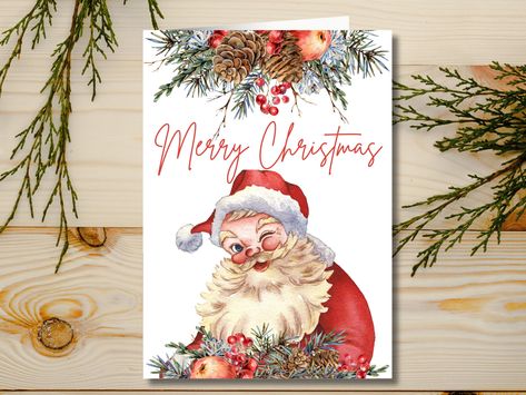 Christmas Card, Printable Christmas Gift, Gift for Husband, Gift for Boyfriend This Winky Santa greeting card is the perfect printable gift for that special someone. The vintage Santa reminds me of a traditional Christmas, it makes me feel warm and comforting (and my son requested the winky Santa specifically, he is very cheeky). Give it as a Christmas gift to a spouse or partner, or anyone special in your life. Simply print, cut, and fold.  WHAT'S INCLUDED Merry Christmas Winky Santa Greeting Card DIGITAL DOWNLOAD This listing is for an instant digital download. No product will be sent to you. Most customers choose to print their products out on computer paper or card stock. SIZING 5"x7" once folded HOW TO GET YOUR FILE - Add the item to your cart, choose your payment method, and complete Santa Christmas Card, Christmas Card Printable, Santa Christmas Cards, Computer Paper, Printable Christmas Cards, Merry Christmas Card, Gift For Husband, Gift For Boyfriend, Traditional Christmas